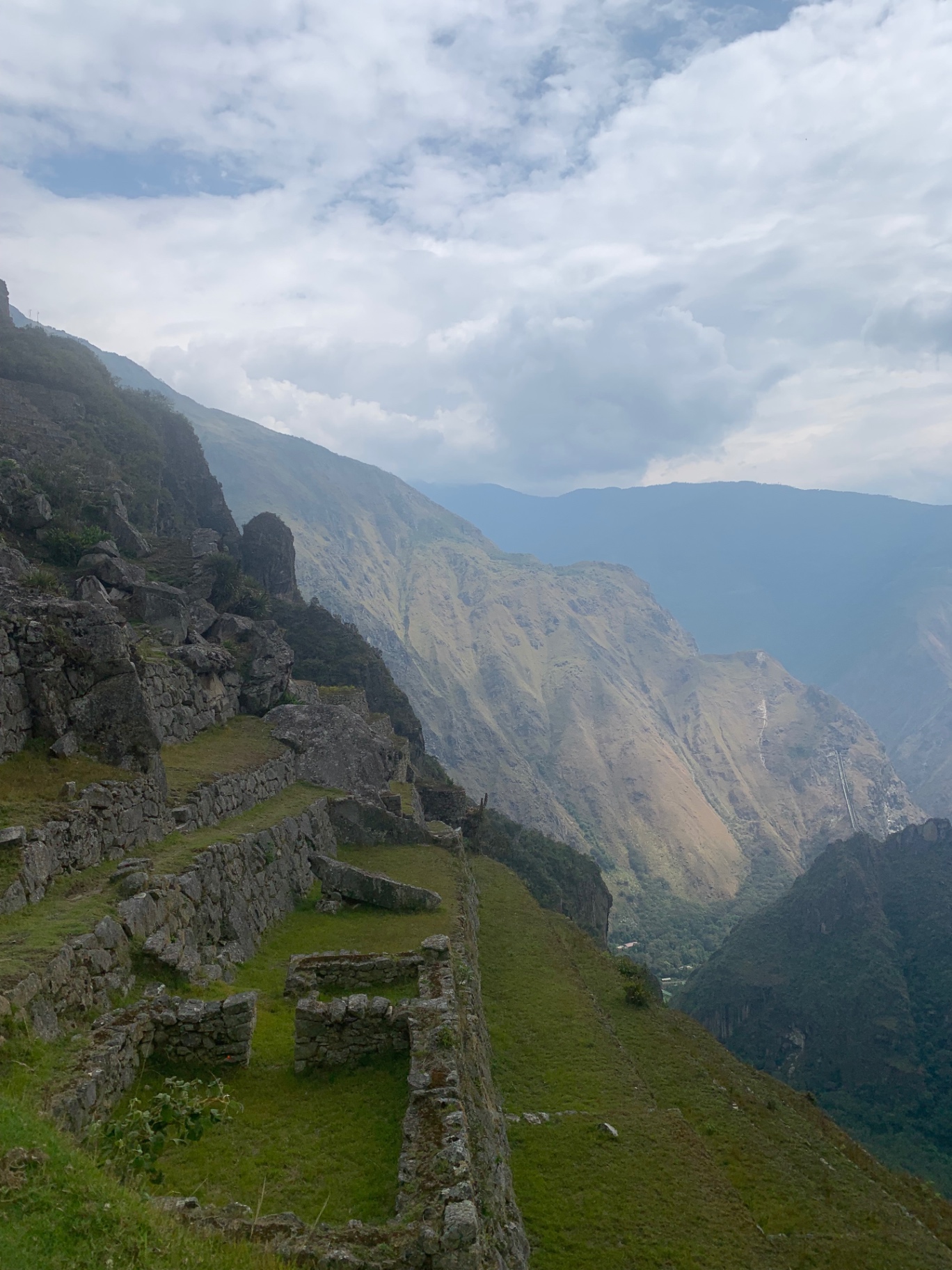 Grass terraces along a cliff edge above the Sacred Valley