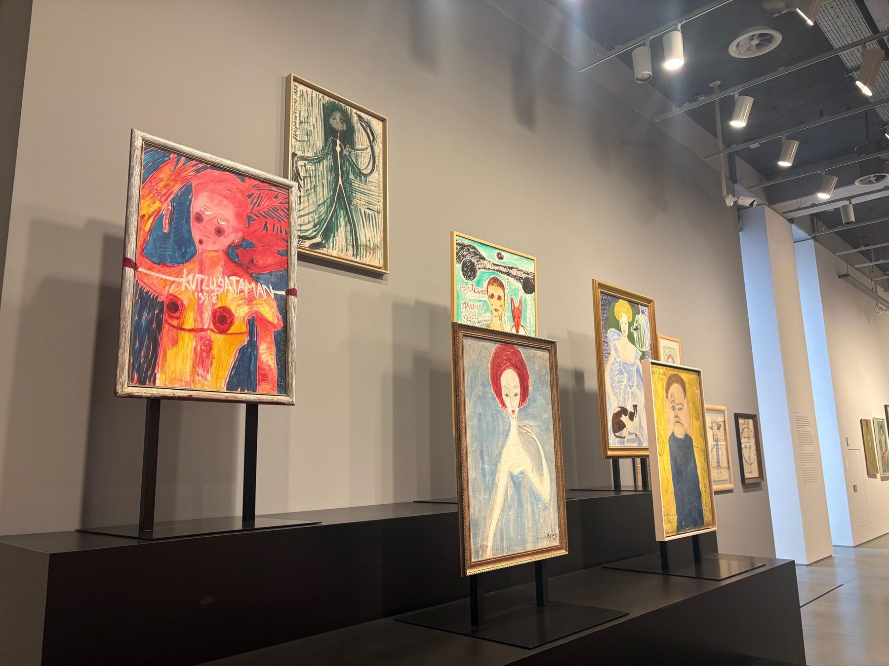 Paintings hung in a contemporary Istanbul gallery