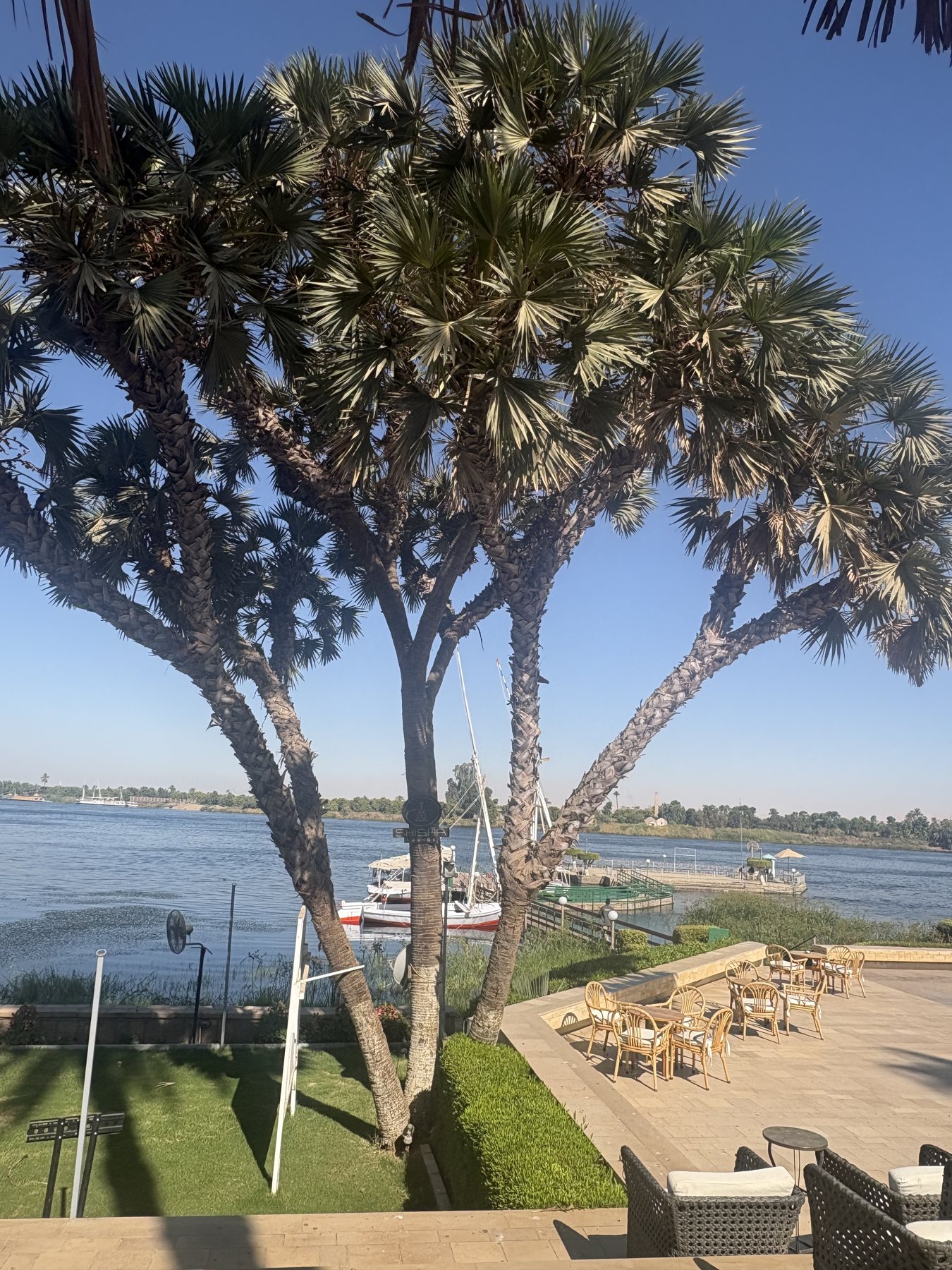 The Nile in daylight with the far bank in haze