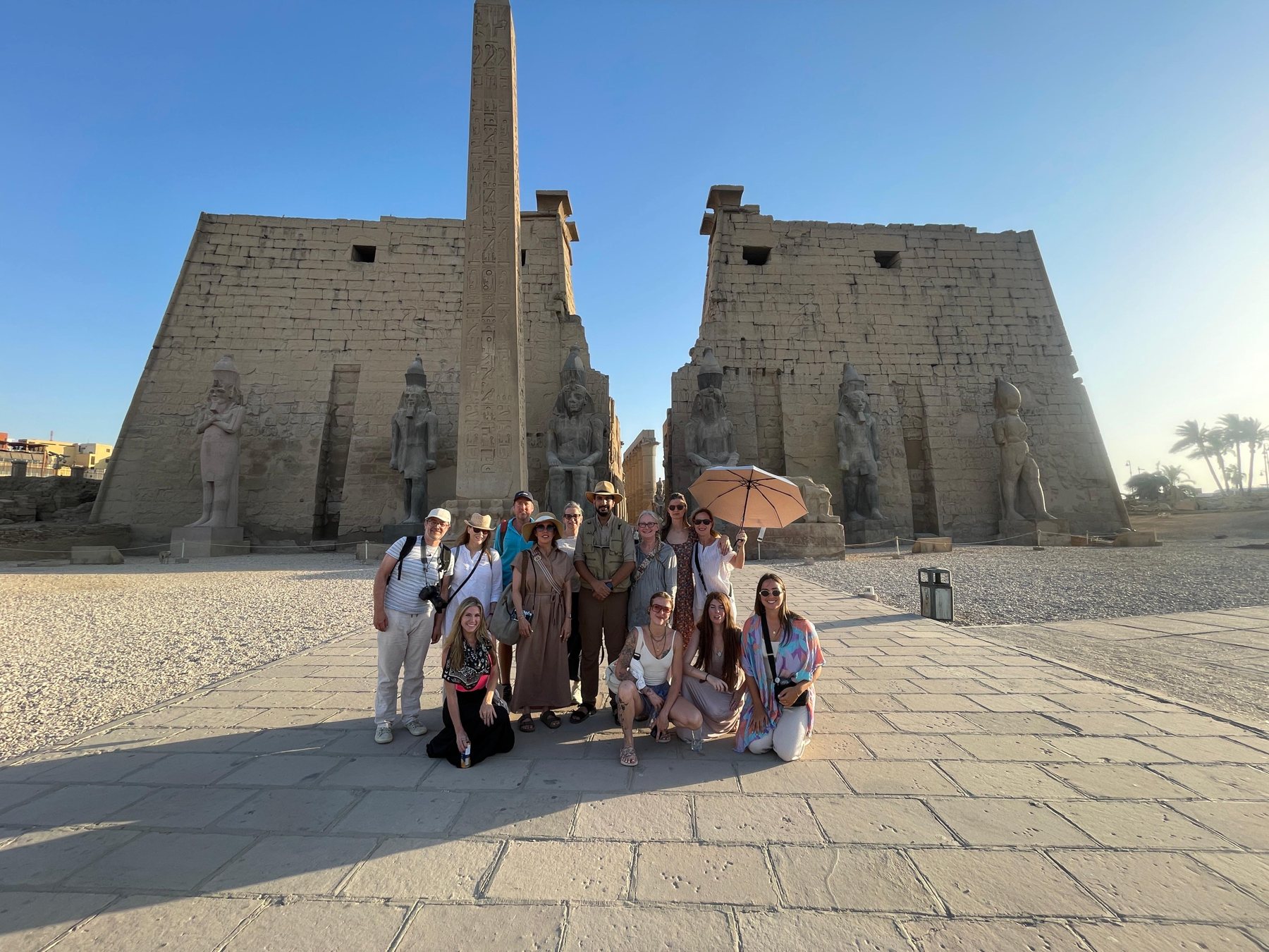 The group gathered at Luxor Temple at night