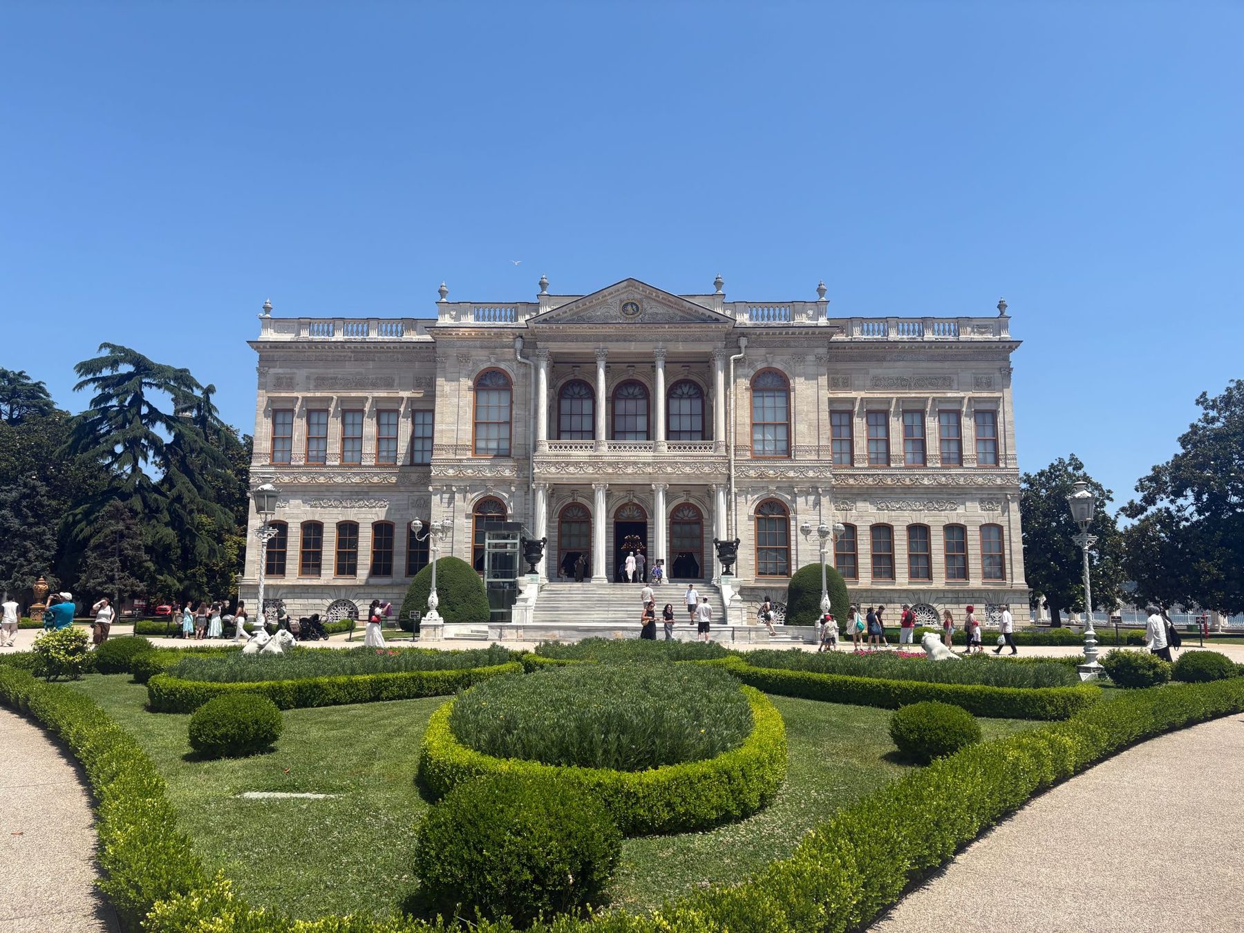 The facade and formal gardens of Dolmabahce Palace