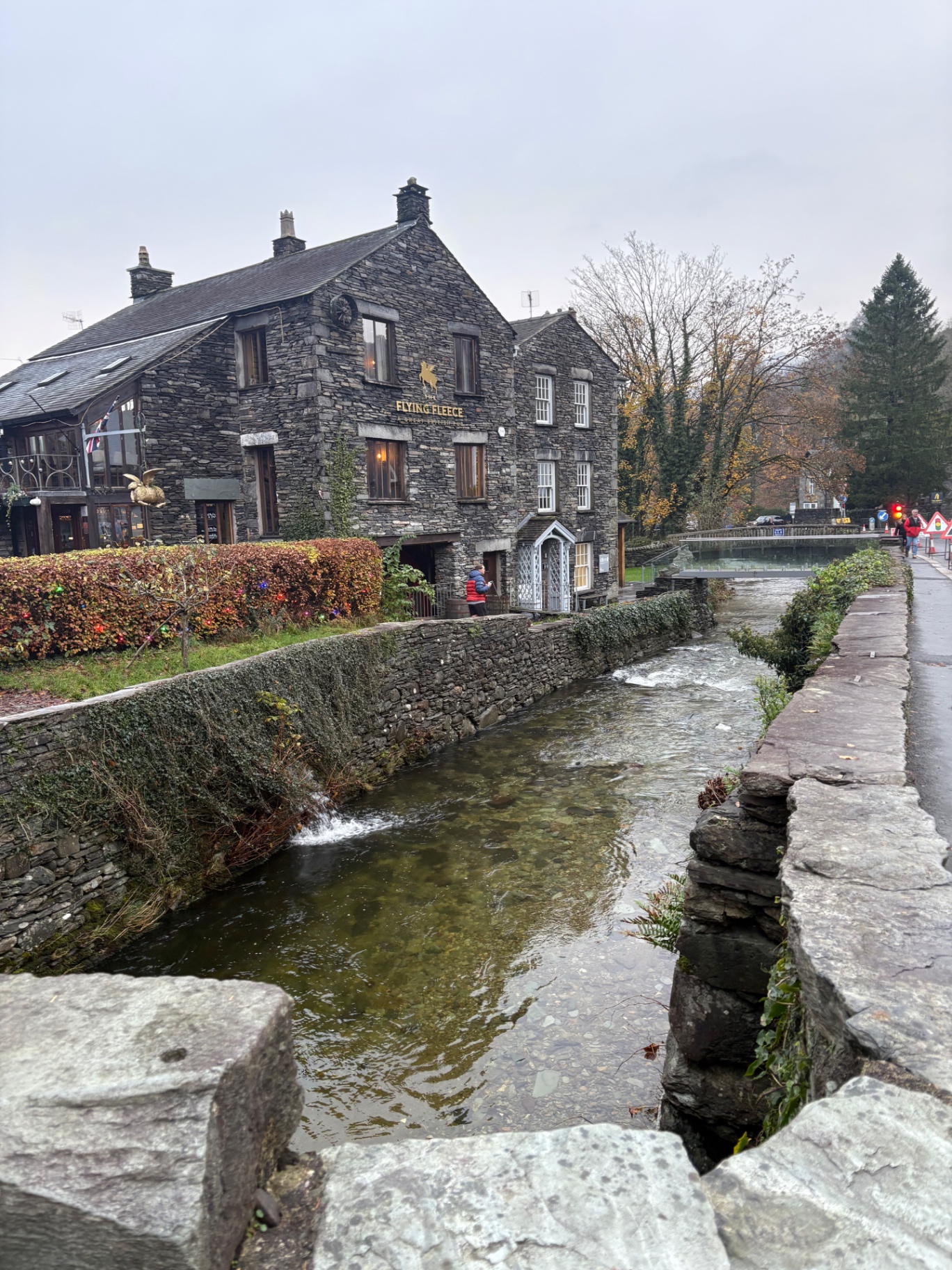 The Flying Fleece stone pub beside Stock Beck in Ambleside