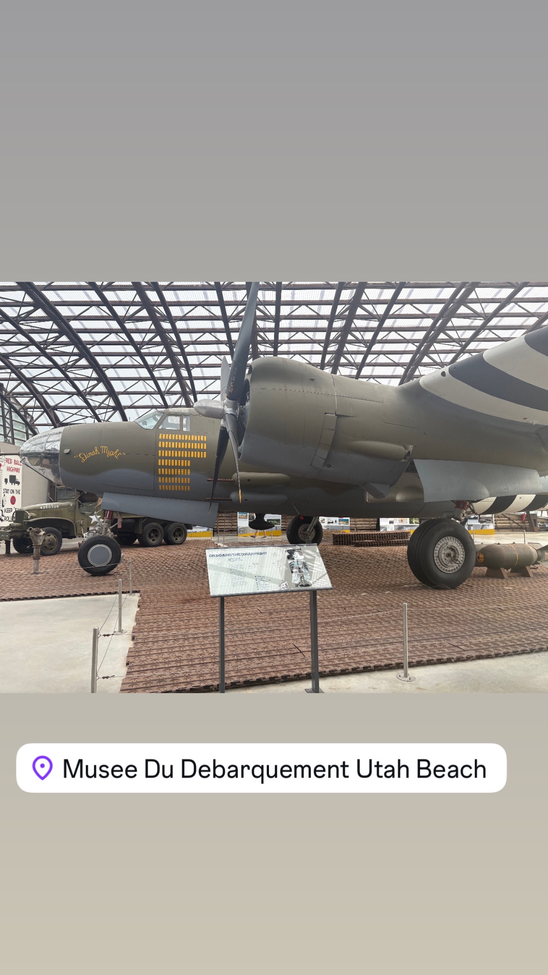 The B-26 Marauder Dinah Might displayed under the glass roof of the Utah Beach museum