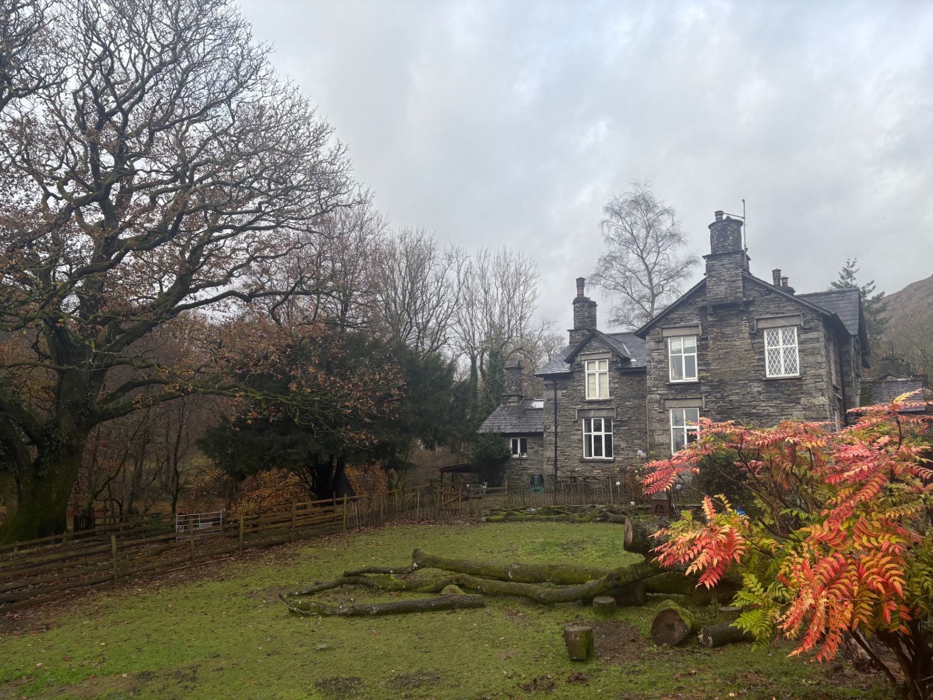Nabb Cottage seen from the garden on a misty autumn morning