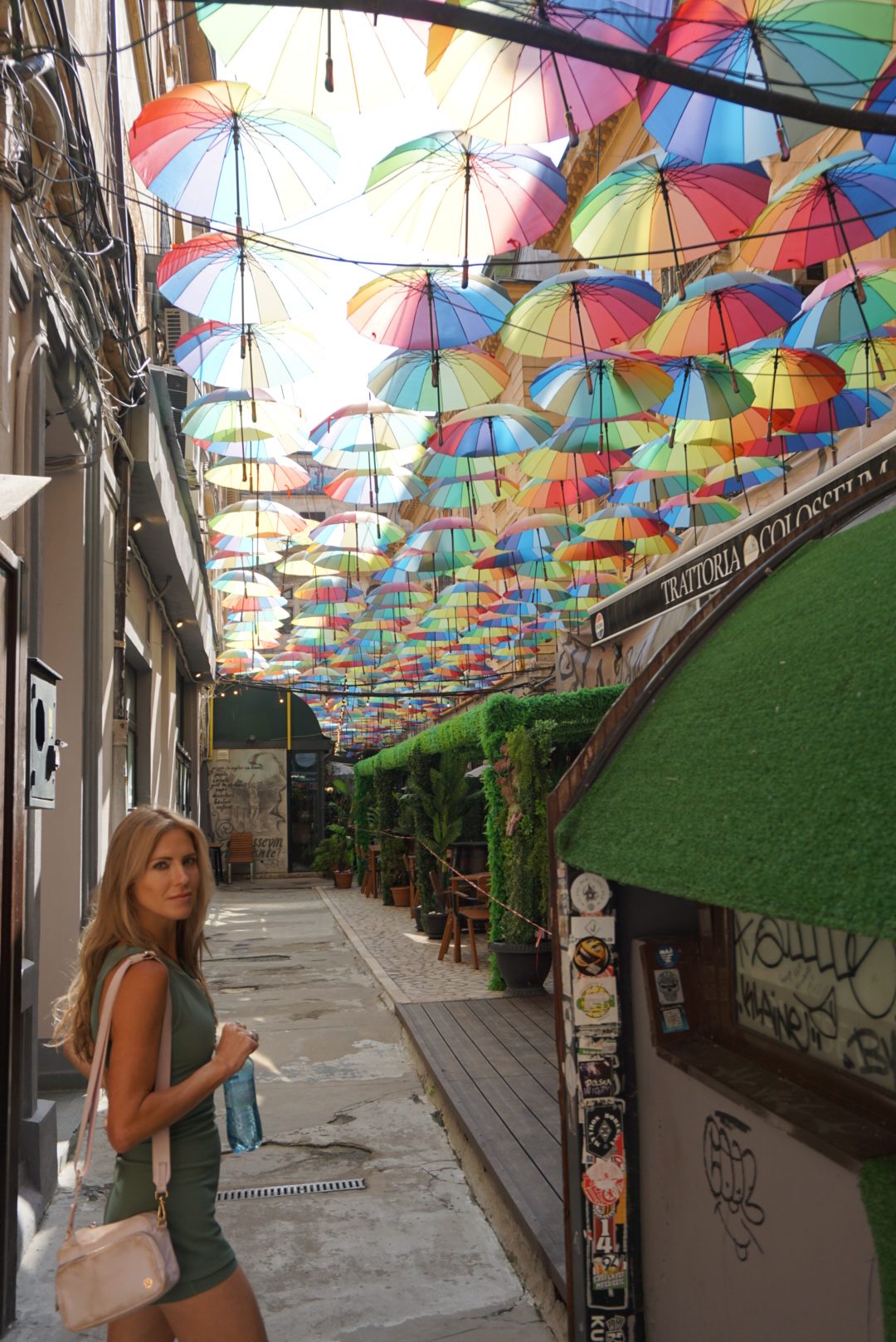 A street of hanging rainbow umbrellas in Bucharest