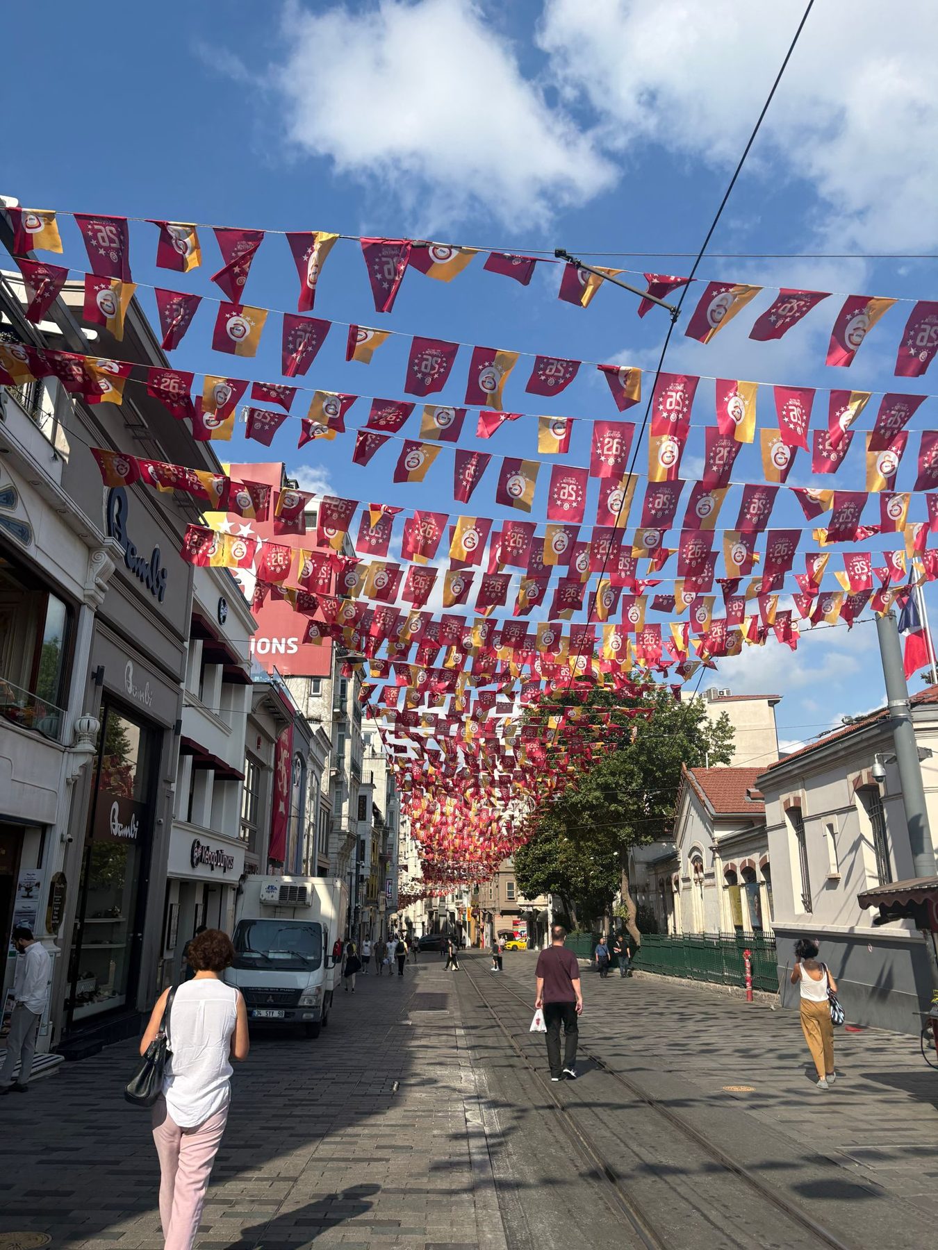 A street strung with red and white bunting in Istanbul