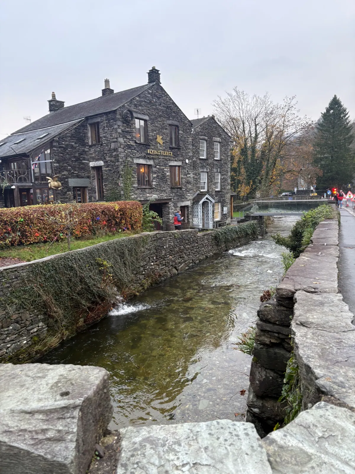 The Flying Fleece stone pub beside Stock Beck in Ambleside
