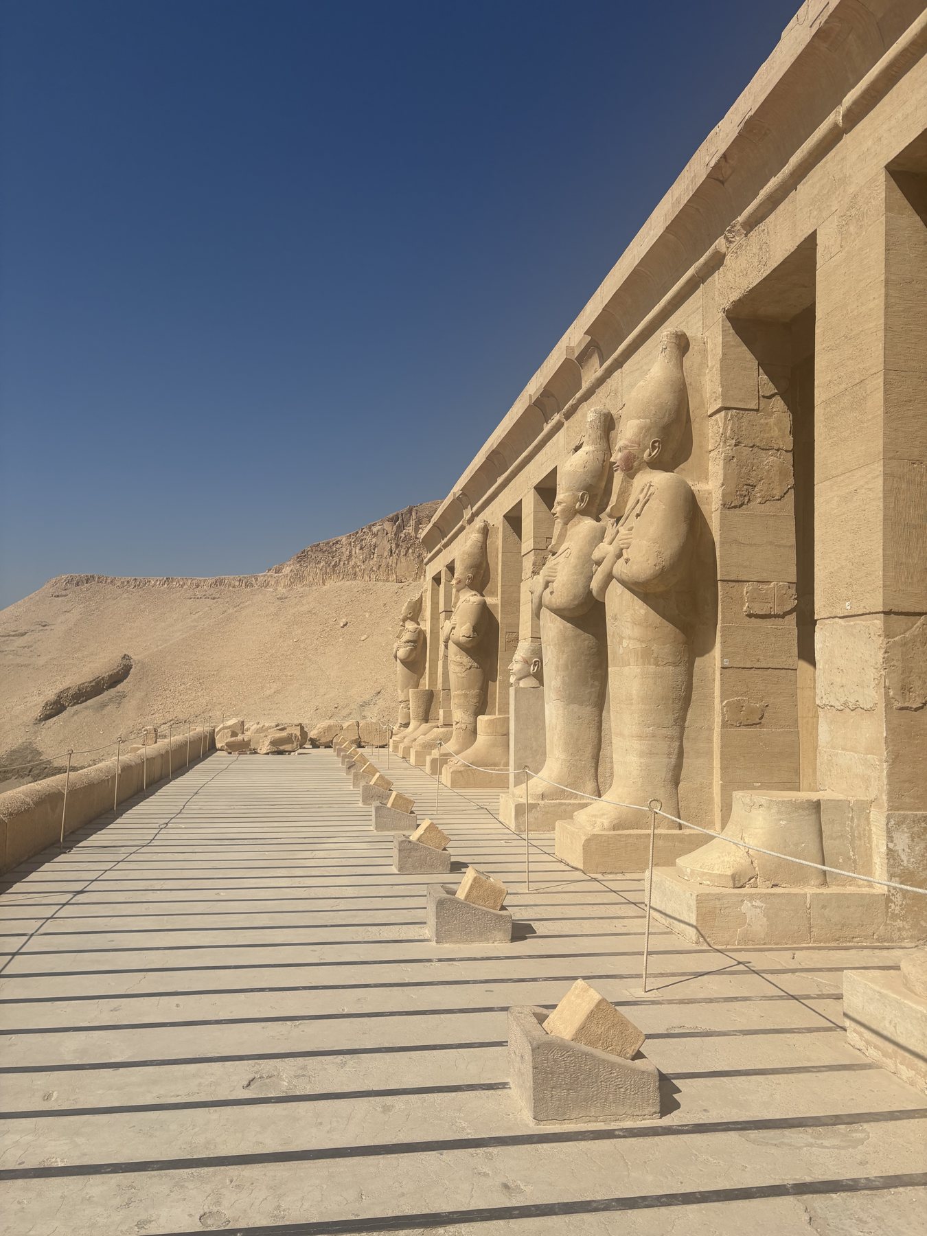 Osiride statues along a temple terrace