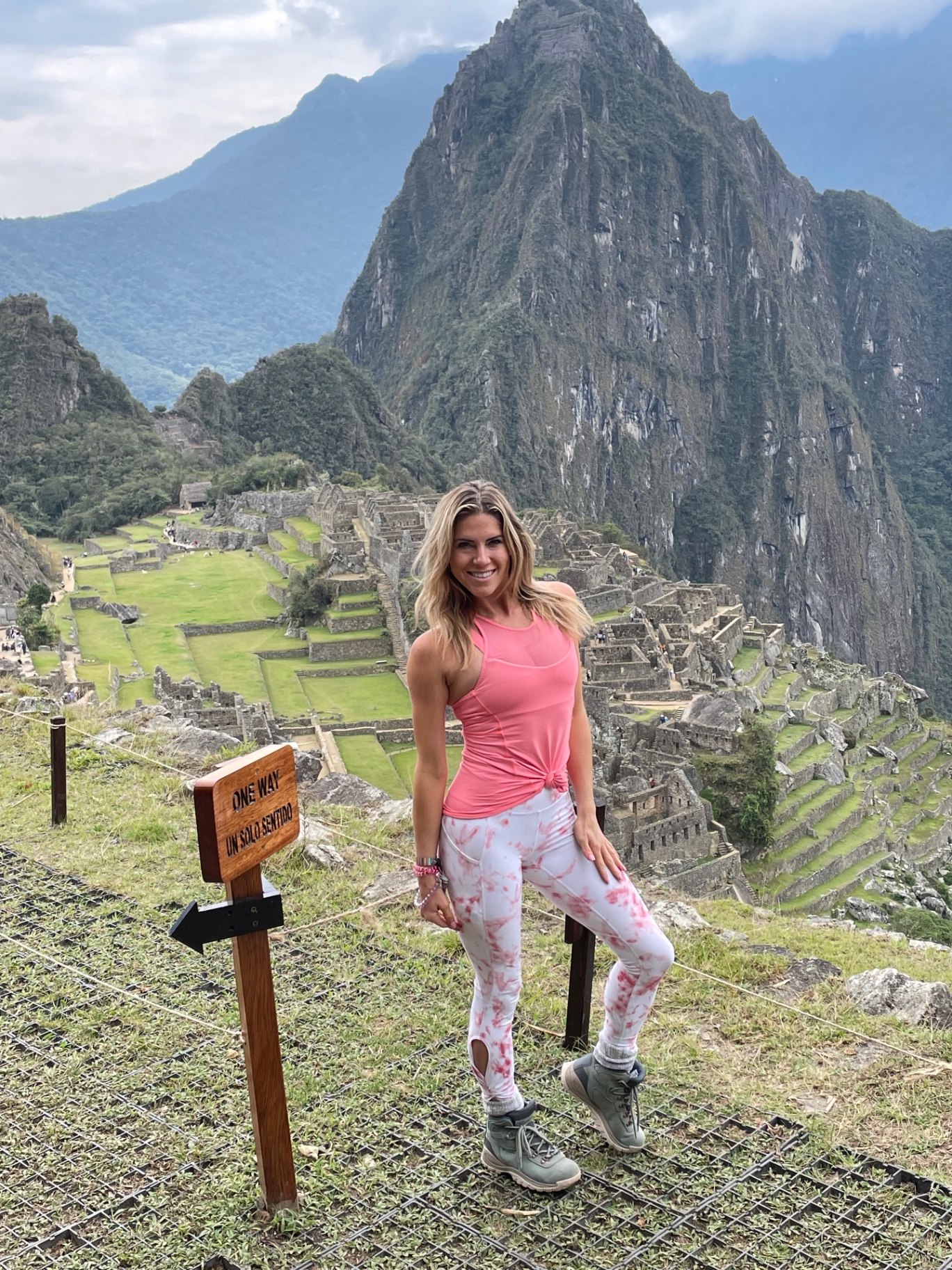 Standing above the Machu Picchu ruins with Huayna Picchu behind